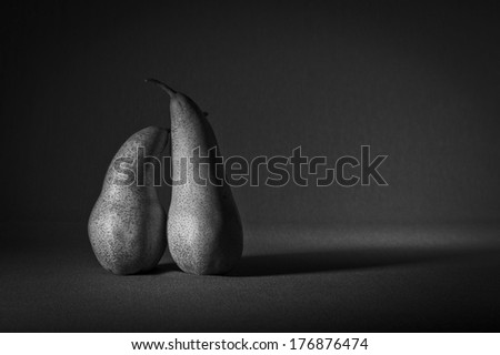 two pears in love. Fruits neighbors in loving attitude