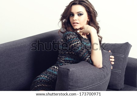Sofa Woman relaxing enjoying luxury lifestyle outdoor day dreaming and thinking looking happy up smiling cheerful. Beautiful young multicultural Asian Caucasian female model in her 20s.