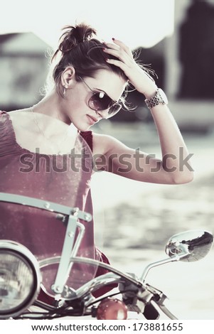 Portrait Of Smiling Girl On Scooter - Outdoor On Street .Retro Shot. Fashion Art Photo