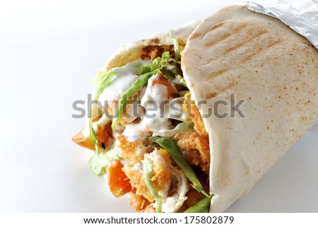 close up of kebab sandwich on white background not isolated.