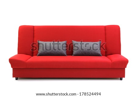 Red Sofa With Pillows, Isolated On White.