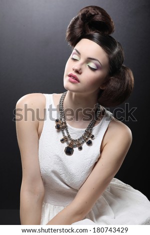 Fashion Beauty Girl. Gorgeous Woman Portrait. Stylish Haircut and Makeup. Hairstyle. Make up. Vogue Style. Sexy Glamour Girl