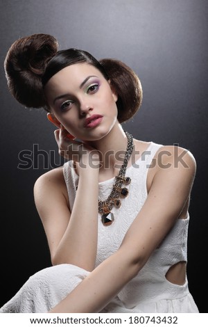Fashion Beauty Girl. Gorgeous Woman Portrait. Stylish Haircut and Makeup. Hairstyle. Make up. Vogue Style. Sexy Glamour Girl