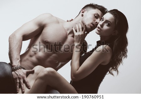 Sexy beauty couple .Portrait of a handsome couple. Glamour colors.