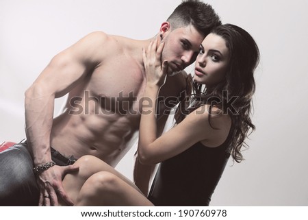 Sexy beauty couple .Portrait of a handsome couple. Glamour colors.