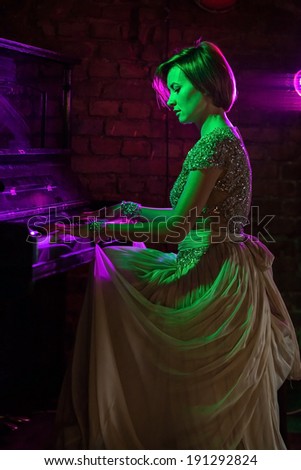 Pianist musician piano musical instrument playing. Music grand piano with woman performer. Fine art photo.