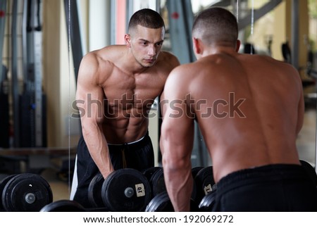Man working out in a fitness club