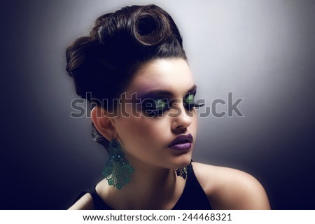 Beautiful face of young adult woman with clean fresh skin. Beauty Model Woman Face. Perfect Skin. Professional Make-up.Makeup. Fashion Art.Vogue Style.