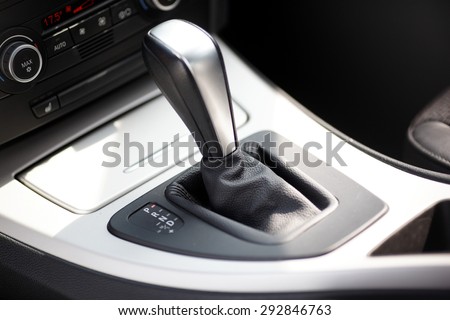 Luxury car interior. Closeup photo of car interiors in bright light
