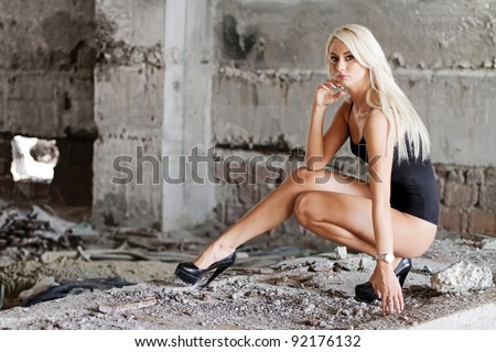 stock photo Sexy ass woman posing at the ruins