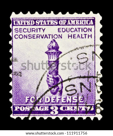 UNITED STATES - CIRCA 1940: stamp printed in United states (USA), shows Torch of Enlightenment, inscription \