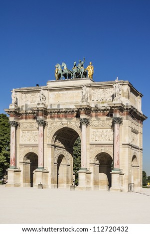 Triumphal Arch (Arc de Triomphe du Carrousel) at Tuileries gardens in Paris, France. Monument was built between 1806-1808 to commemorate Napoleon\'s military victories.