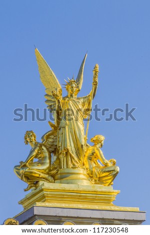 Architectural details of Opera National de Paris: Poetry roof sculpture by Charles Gumery. Grand Opera (Garnier Palace) is famous neo-baroque building in Paris, France - UNESCO World Heritage Site.