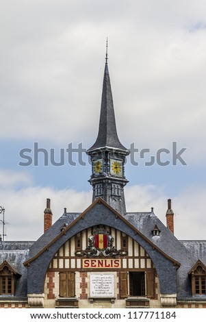 Old station building in Senlis (1922), decorated with the coat of arms. Senlis - commune in Oise department in northern France. It has a long and rich heritage, having traversed centuries of history.