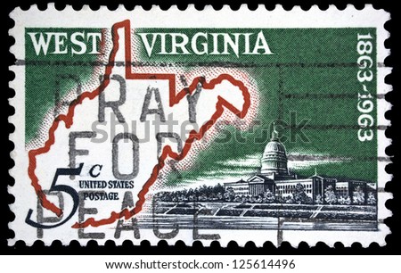 UNITED STATES OF AMERICA - CIRCA 1963: A stamp printed in USA, shows Map of West Virginia and State Capitol, with inscription \