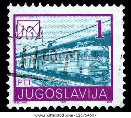 YUGOSLAVIA - CIRCA 1986: Stamp printed in Yugoslavia shows a Electric mail train and envelope, without inscription, from series \