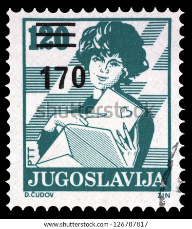 YUGOSLAVIA - CIRCA 1990: Stamp printed in Yugoslavia shows a Woman sending love letter, without inscription, from series \