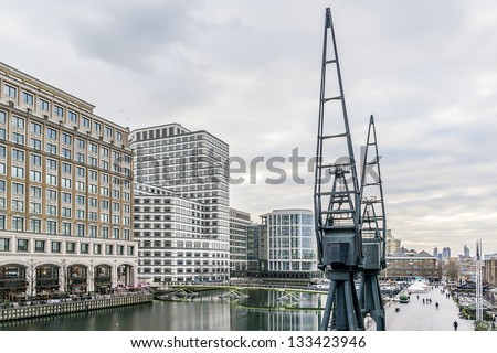 LONDON, UK - MARCH 17: Canary Wharf, located in West India Docks on Isle of Dogs - formed part of busiest port in world, is a major business district (1,300,000 sqm) in London on March 17, 2013, UK.
