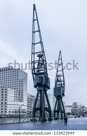 LONDON, UK - MARCH 17: Canary Wharf, located in West India Docks on Isle of Dogs - formed part of busiest port in world, is a major business district (1,300,000 sqm) in London on March 17, 2013, UK.