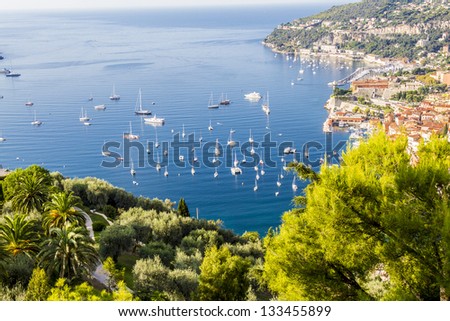 View of Mediterranean luxury resort and bay with yachts. Nice, Cote d\'Azur, France. French Riviera - turquoise sea and perfect blue sky.