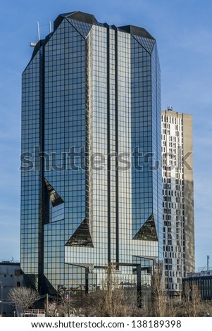 PARIS - MAR 18: High-rise buildings (commercial and residential) in Front de Seine (Beaugrenelle) - district in Paris, located along river Seine right at South of Eiffel Tower on March 18, 2013, Paris