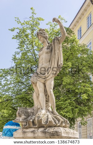 An ancient statue of Amphitrite in the central square of Lviv - Market (Rynok) Square near City Hall. Lviv - city in western Ukraine, capital of historical region Galicia