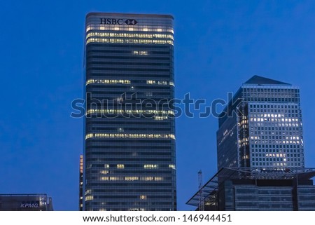 LONDON - MAY 26: Skyscraper One Canada Square and HSBC UK Head Quarter at night on May 26, 2013, Canary Wharf, London. Canary Wharf is a major business district located in Borough of Tower Hamlets.