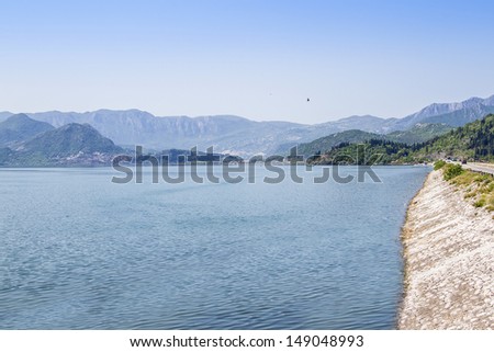 Beautiful Skadar Lake is a lake on border of Montenegro and Albania - the largest lake in the Balkan Peninsula. Its surface can vary between 370 km2 and 530 km2 of which 2/3 is in Montenegro. Europe.