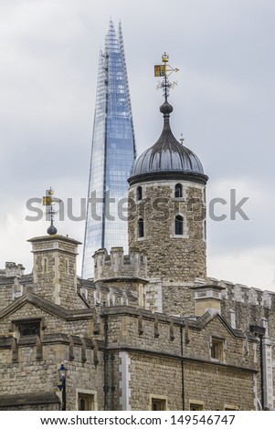 Tower of London (Her Majesty\'s Royal Palace and Fortress) - historic castle on the north bank of the River Thames in central London - a popular tourist attraction. View from outside walls.