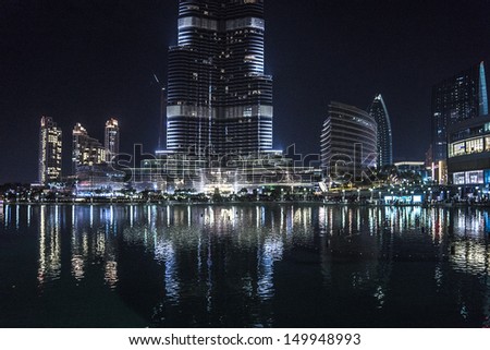 DUBAI, UAE - OCTOBER 1: Night view of Burj Khalifa Lake on October 1, 2012, Dubai, United Arab Emirates. Burj Khalifa Lake - 12-hectare man-made Lake near Burj Khalifa skyscraper.