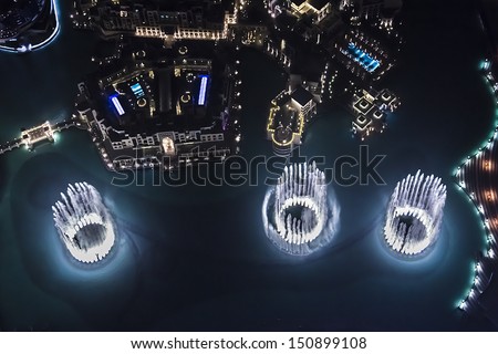 Dubai, Uae - October 1: A Record-Setting Fountain System Set On Burj Khalifa Lake - 6600 Lights And 25 Projectors, It Shoots Water 150 M Into The Air, At October 1, 2012 In Dubai, United Arab Emirate.