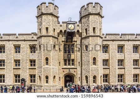 TOWER OF LONDON, UK Ã¢Â?Â? MAY 26, 2013: Many visitors to Crown Jewels gallery (Waterloo Barracks) in Her MajestyÃ¢Â?Â?s Royal Palace and Fortress Tower of London - a very popular tourist attraction.