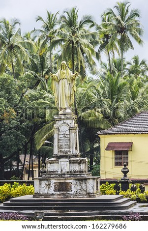 Sacred Heart of Jesus - statue at the yard of St. Catherine Cathedral. St. Catherine Cathedral (1640) - largest church in India is dedicated to Catherine of Alexandria. Old Goa. India