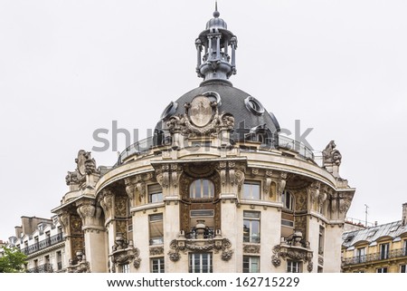 PARIS - JULY 12, 2012: View of Felix Potin buildings (architect Paul Auscher - former head office, now a Monoprix) on Boulevard de Sebastopol in Paris. Felix Potin - French businessman (1820 -1871).