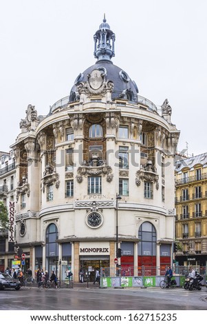 PARIS - JULY 12, 2012: View of Felix Potin buildings (architect Paul Auscher - former head office, now a Monoprix) on Boulevard de Sebastopol in Paris. Felix Potin - French businessman (1820 -1871).