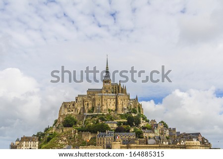 Le Mont Saint-Michel is a rocky tidal island in Normandy - one of the most visited tourist sites in France. Mont-Saint-Michel and its bay are part of UNESCO list of World Heritage Sites