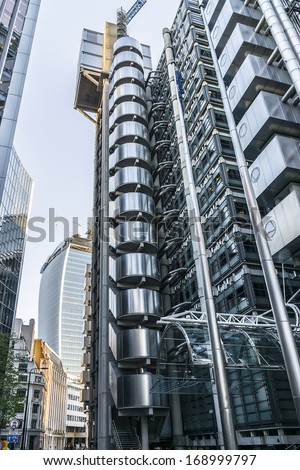 LONDON, UK - JUNE 03, 2013: Buildings Lloyd (Inside-Out Building) at sunset - home of insurance institution Lloyd of London. Like Pompidou Centre in Paris was designed by Rogers (1986).