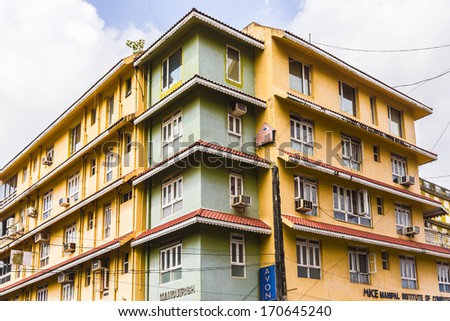 PANJIM, GOA, INDIA - SEPTEMBER 30, 2013: View of streets of the capital of the Goa state: old and new houses. Panjim (Panaji) - capital of Indian state of Goa and Goa\'s largest city.