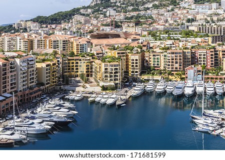 Aerial View on Fontvieille and luxury yachts in harbor of Monaco. Principality of Monaco, French Riviera, Western Europe.