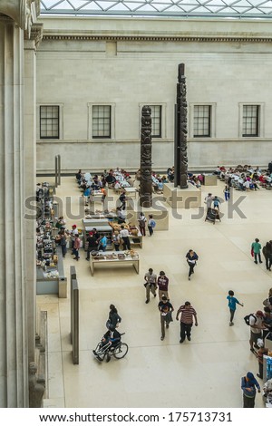 LONDON, UK - AUGUST 18, 2013: People visiting the main court of British Museum - museum of human history and culture and one of the top attractions of London. British Museum was established in 1753.