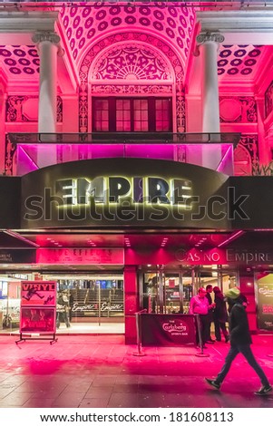 LONDON, UK - MARCH 17, 2013: View of Empire - large cinema on north side of Leicester Square in City of Westminster, London at night. Empire was built in 1884 by Thomas Verity.