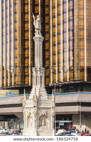 MADRID, SPAIN - NOVEMBER 20, 2013: Monument to explorer Christopher Columbus (Cristobal Colon) on the Columbus square (plaza de Colon).