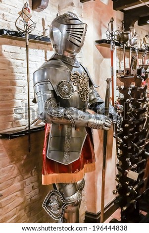 TOLEDO, SPAIN - NOVEMBER 18, 2013: Armor, knives, swords - souvenirs of Toledo. Toledo is historically known for its production of steel, which is currently the most popular souvenir from this city.