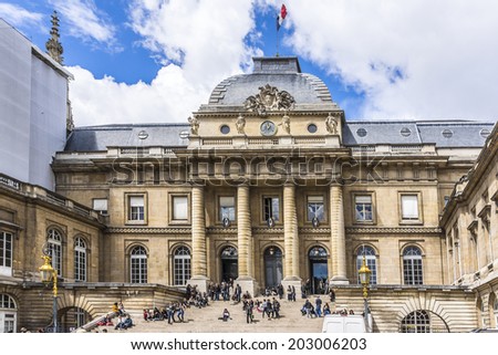 PARIS, FRANCE - MAY 13, 2014: The Palais de Justice (Palace of Justice), formerly the Palais de la Cite. Boulevard du Palais in central Paris. The Cour du Mai.