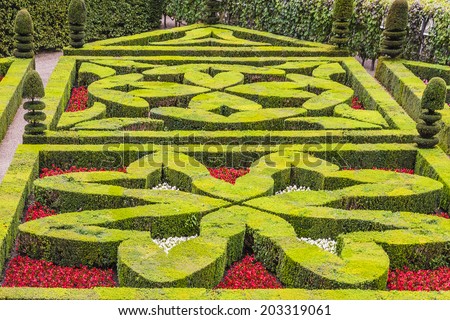 VILLANDRY, FRANCE - JULY 20, 2012: Traditional French garden. Ornamental Garden in Chateau de Villandry. Chateau de Villandry (castle-palace) - world known for its amazing gardens.