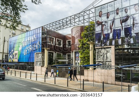 PARIS, FRANCE - JULY 8, 2014: French Football Federation building decorated with colors of national team before 2014 FIFA World Cup - international soccer tournament taking place in Brazil.