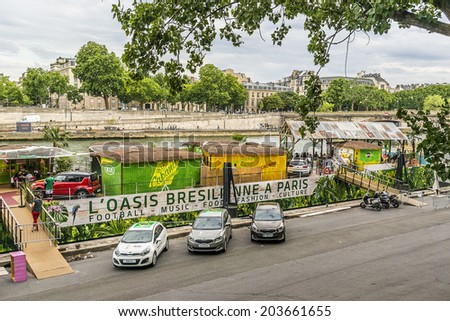 PARIS, FRANCE - JULY 8, 2014: Fan Zone - an Oasis on banks of Seine for football fans for period of FIFA World Cup - international soccer tournament taking place in Brazil (12 June - 13 July, 2014).