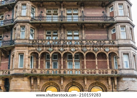 LONDON, UK - MARCH 17, 2013: Famous Four star Hotel Russell on Russell Square in London. Hotel Russell was built in 1898 by Charles Fitzroy Doll in style \