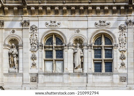 Architectural fragments of Hotel-de-Ville (City Hall, 1882, by architects Theodore Ballou and Edouard Deperta) in Paris - building housing City of Paris's administration. France.