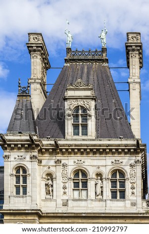 Architectural fragments of Hotel-de-Ville (City Hall, 1882, by architects Theodore Ballou and Edouard Deperta) in Paris - building housing City of Paris\'s administration. France.